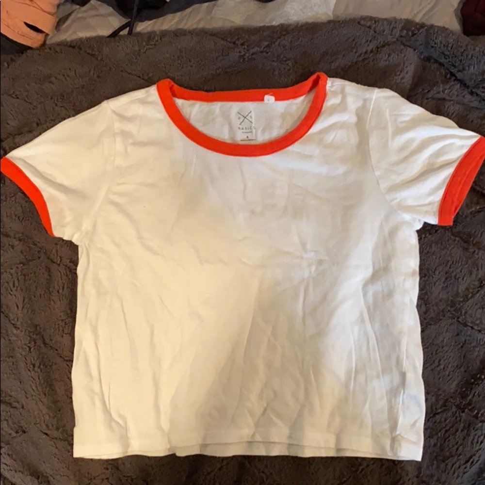 white crop top with orange outline